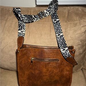 Elegant Brown Crossbody Bag with Leopard Strap
